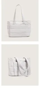 Detailed view of lightweight quilted tote bag, soft padded shoulder bag with multiple compartments.