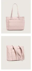 Light pink quilted puffer tote bag with multiple compartments, soft lightweight shoulder bag.
