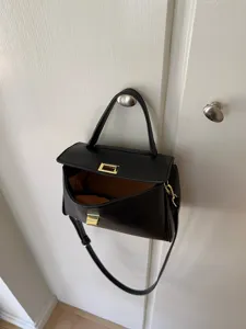 Sac à main bandoulière en cuir PU noir pour femme sac de transport élégant et polyvalent