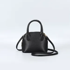 Black dome handbag for women, faux leather shoulder crossbody bag with top handles.