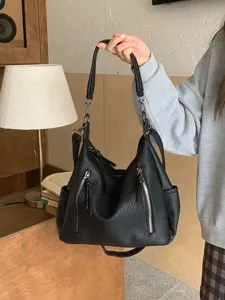 Classic black leather hobo shoulder bag with stylish front zippers and large capacity for women.