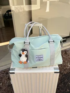 Large capacity travel duffel bag lightweight waterproof with trolley sleeve for women short trip
