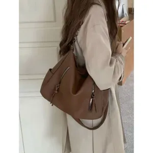 Retro brown PU leather shoulder tote bag, vintage casual underarm handbag for women daily commuting.