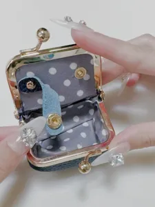 Mini clasp coin purse for women, cute polka dot lining small jewelry storage pouch bag.