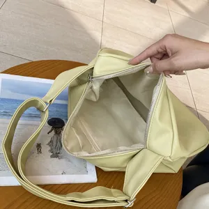 Chic solid color shoulder bag with wide strap, trendy casual crossbody bag for daily commute.