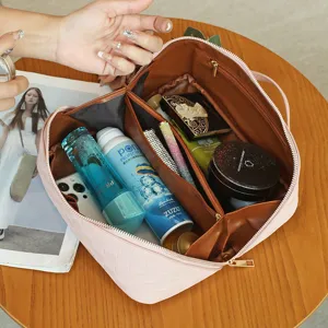 Pink quilted travel makeup bag, large capacity cosmetic organizer with compartments for women.