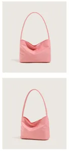 Minimalist nylon embroidered underarm shoulder bag, lightweight solid color commuter handbag.