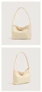 Minimalist beige nylon underarm shoulder bag for women, lightweight casual commuter daily handbag.