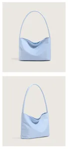 Minimalist light blue nylon embroidered underarm shoulder bag, elegant casual everyday purse.