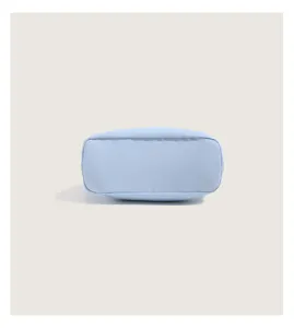 Light blue nylon underarm bag detail view, solid color minimalist casual daily handbag.