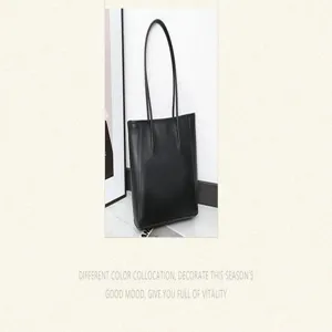 Black leather tote bag for women, large capacity shoulder bag for daily commuting and office.