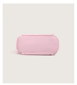 Detailed bottom view of the pink padded quilted tote bag, minimalist style and spacious.