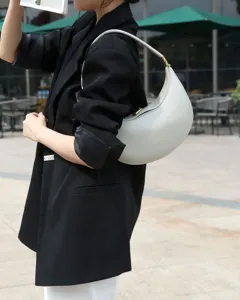 Details of light grey leather crescent hobo shoulder bag, chic women daily commuter purse.
