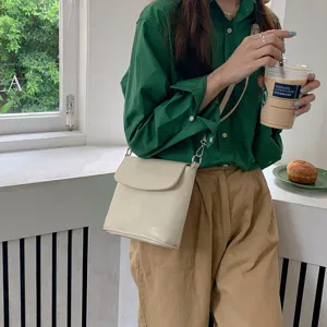 Minimalist solid color flap crossbody bag for women, chic daily shoulder bag with metal hardware.