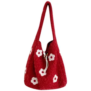 Red plush bucket bag with cute white flower embroidery, drawstring shoulder bag for women.