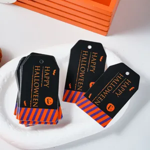 Halloween paper tags with pumpkin print, ideal for DIY holiday party gift decoration.