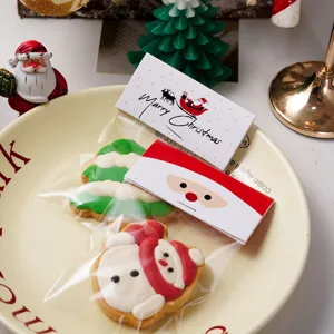 Christmas cookie detail shot featuring cute header card packaging and festive holiday treats.