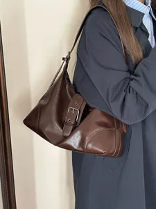 Retro dark brown leather shoulder bag for women, vintage slouchy underarm hobo handbag.