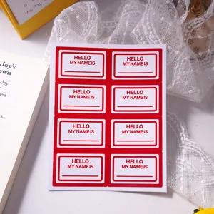 Detail view of red border name tag sticker sheet, cute children packaging label for school.