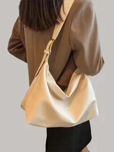 Sac à épaule souple en cuir doux minimaliste pour femme, grand cabas fourre-tout casual.