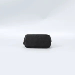 Compact black cosmetic zipper bag, classic daily makeup storage pouch detail view.