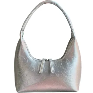 Stylish silver metallic hobo shoulder bag, trendy crescent design for daily commute.