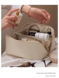 Beige PU makeup bag detail showing large capacity, interior multi-compartment and zipper.