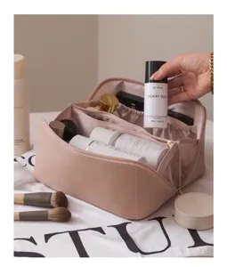 Large capacity PU leather makeup bag with multi-compartments for travel and daily use.