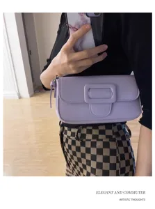 Chic purple baguette shoulder bag with stylish buckle, elegant commuter crossbody handbag.