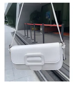 White minimalist baguette shoulder bag with chic square buckle design for women everyday fashion.