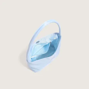 Light blue nylon underarm shoulder bag for women, minimalist casual commuting hobo handbag.