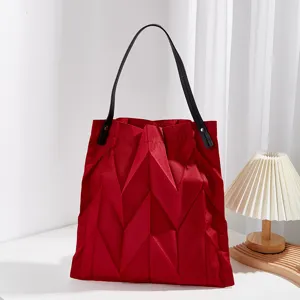 Red pleated canvas tote bag, stylish geometric shoulder bag for women daily commute.