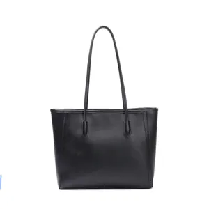 Black leather tote bag for women, large capacity stylish shoulder bag for daily commute.