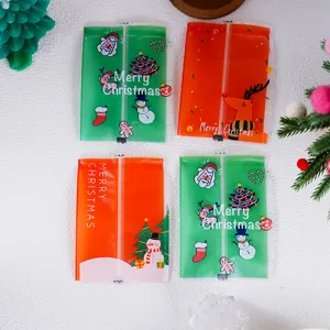 Christmas frosted machine sealed bags cute cartoon elk and santa pattern cookie packaging.