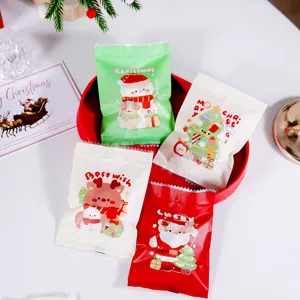Christmas gift packaging bags detail, cute cartoon design for cookies, nougat and snacks.