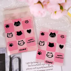Cute cartoon cat self-sealing bags pink checkered gift cookie packaging detail view