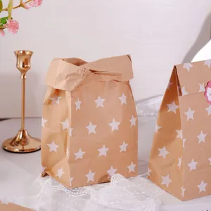 Brown kraft paper bags with white star patterns, ideal for bakery and gift packaging.