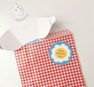 Children's day decorative stickers with red and white plaid gift paper bag and cute paper card.