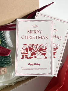 Christmas greeting card set featuring cute Santa Claus designs and warm holiday text.