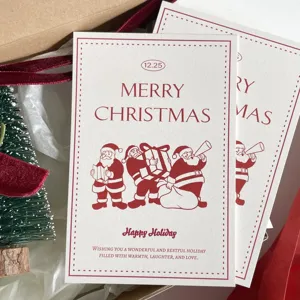 Christmas greeting cards set, red holiday design with Santa Claus illustrations for gifts.
