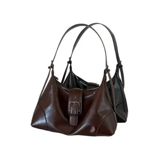 Vintage glossy leather underarm shoulder bag for women, chic retro handbag purse.