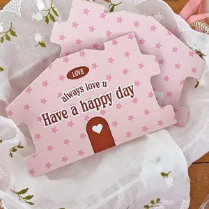 Carte intestazione a forma di casa con stelle rosa per confezione regalo biscotti caramelle