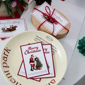 Christmas greeting cards detail shot showing vintage Santa design for gift wrapping and decor.