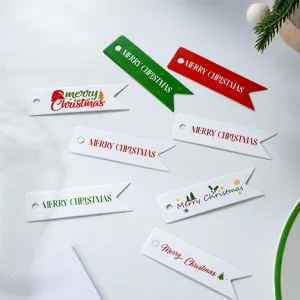 Christmas gift wrapping metal paper tags set with merry christmas text holiday decor.