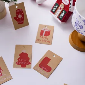 Christmas kraft paper gift tags with red holiday prints, perfect for DIY wrapping and decor.
