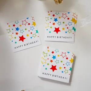 Detailed close-up of square dopamine colorful star birthday greeting cards with blessing text.