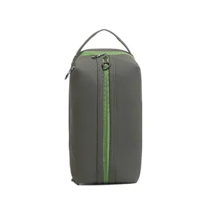 Minimalist water-repellent PU cosmetic bag with color-block zip design for daily travel storage.