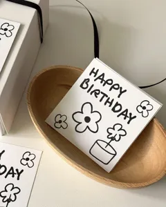 Chic birthday greeting card featuring hand-drawn floral design and text for gifts.