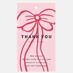 Pink thank you gift card tag with red bow design, perfect for holiday wrapping and decor.
