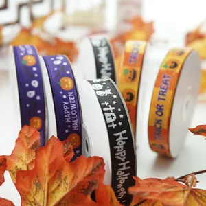 Halloween printed ribbon rolls for DIY bows and festival gift wrapping decorations.